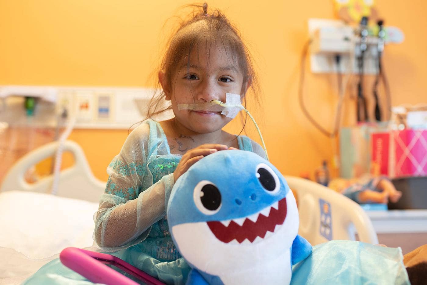 Girl Receiving Baby Shark Toy